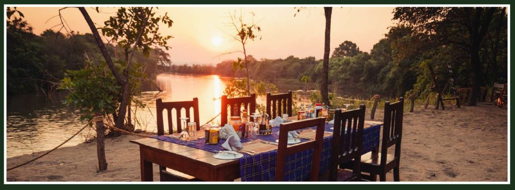 Dhalla Tigerfishing camp, set up ready to dine afer a long days flyfishing on the Mnyera River - Tanzania.