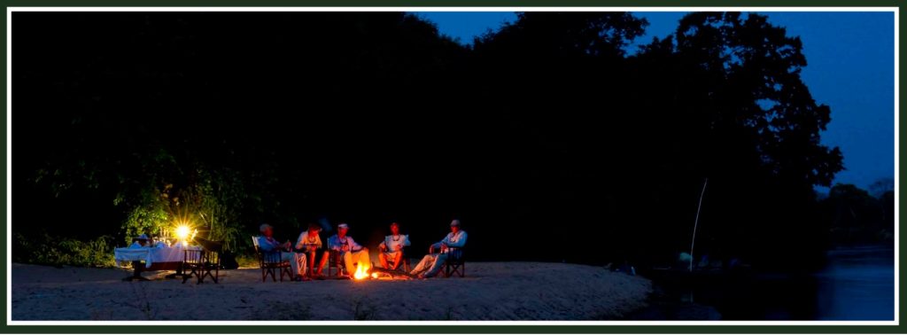 Samaki Tigerfish camp, enjoying a cold beer after a long days fly fishing on the Ruhudji River - Tanzania.